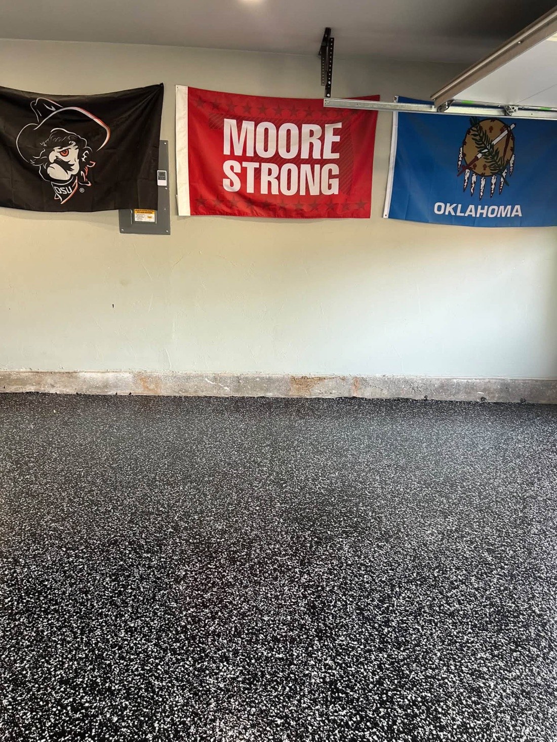 Finished flake garage floor along the back wall