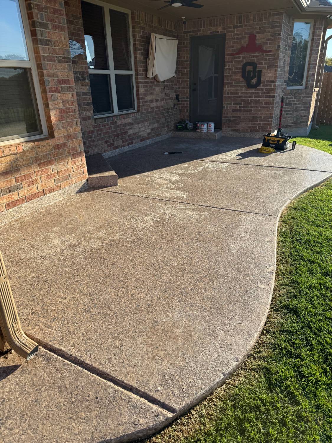 Patio before the refresh: dull, worn topcoat with chalky patches