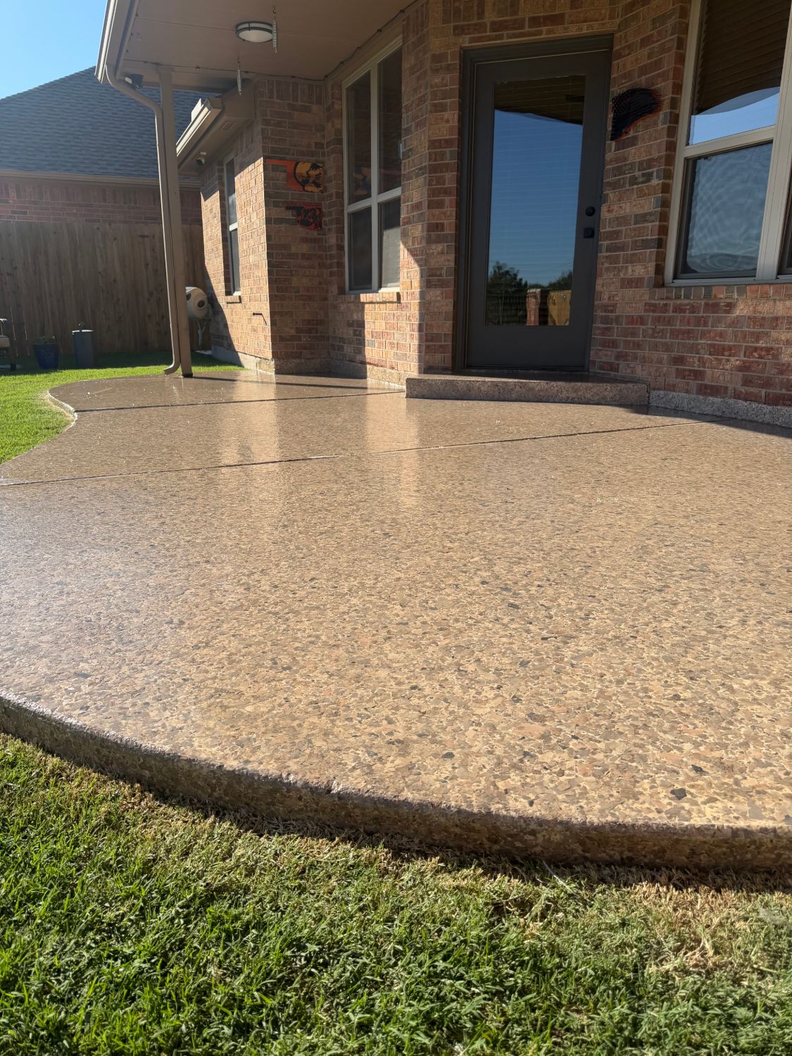 After: the patio with its fresh glossy topcoat